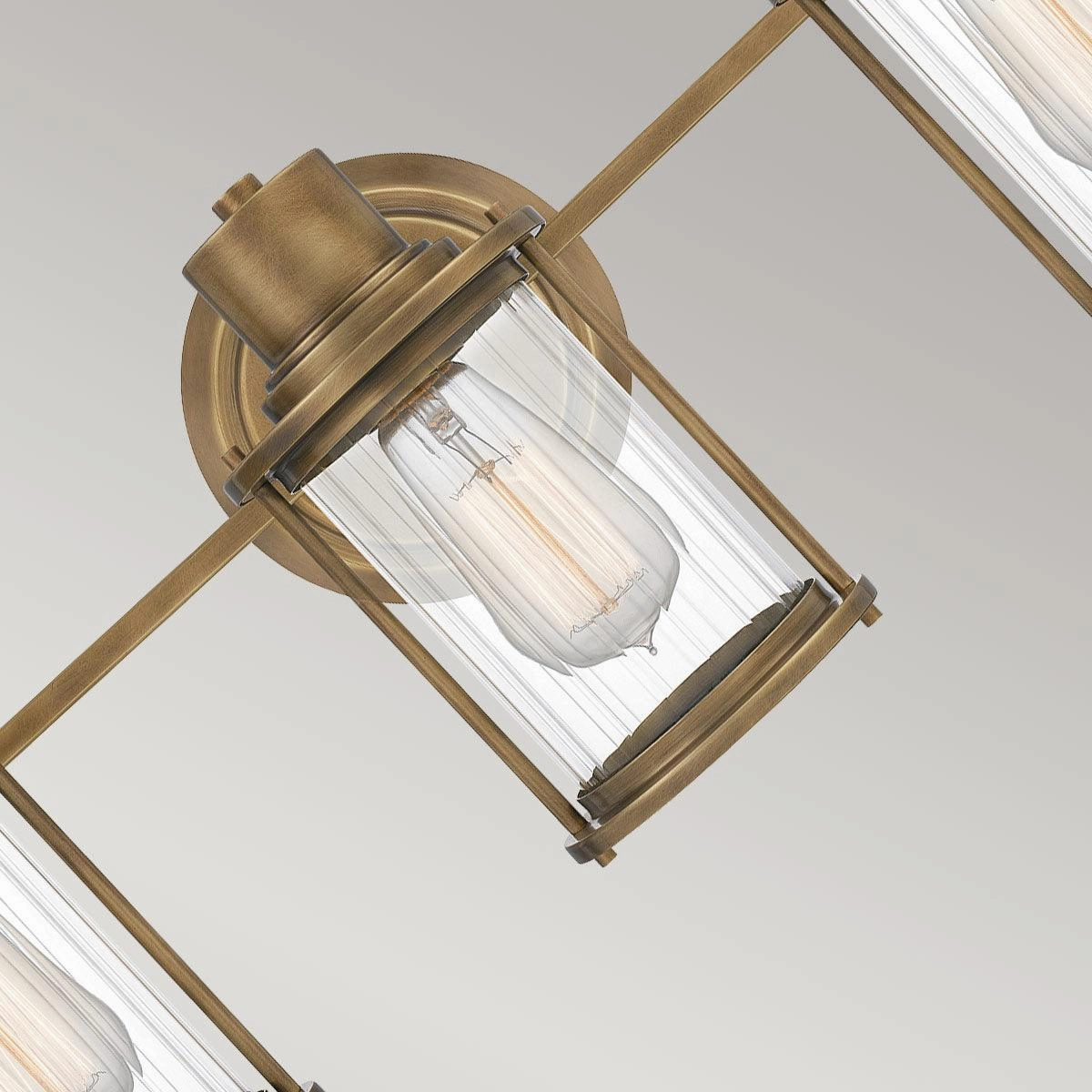 Quoizel Riggs 3 Light Brass Bathroom Wall Light