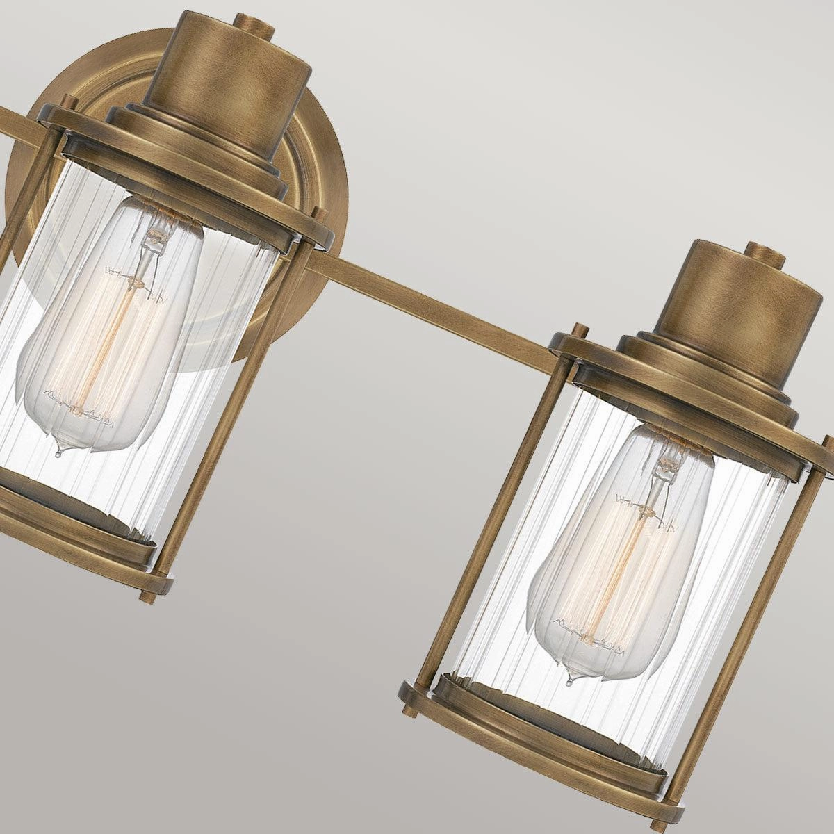 Quoizel Riggs 3 Light Brass Bathroom Wall Light