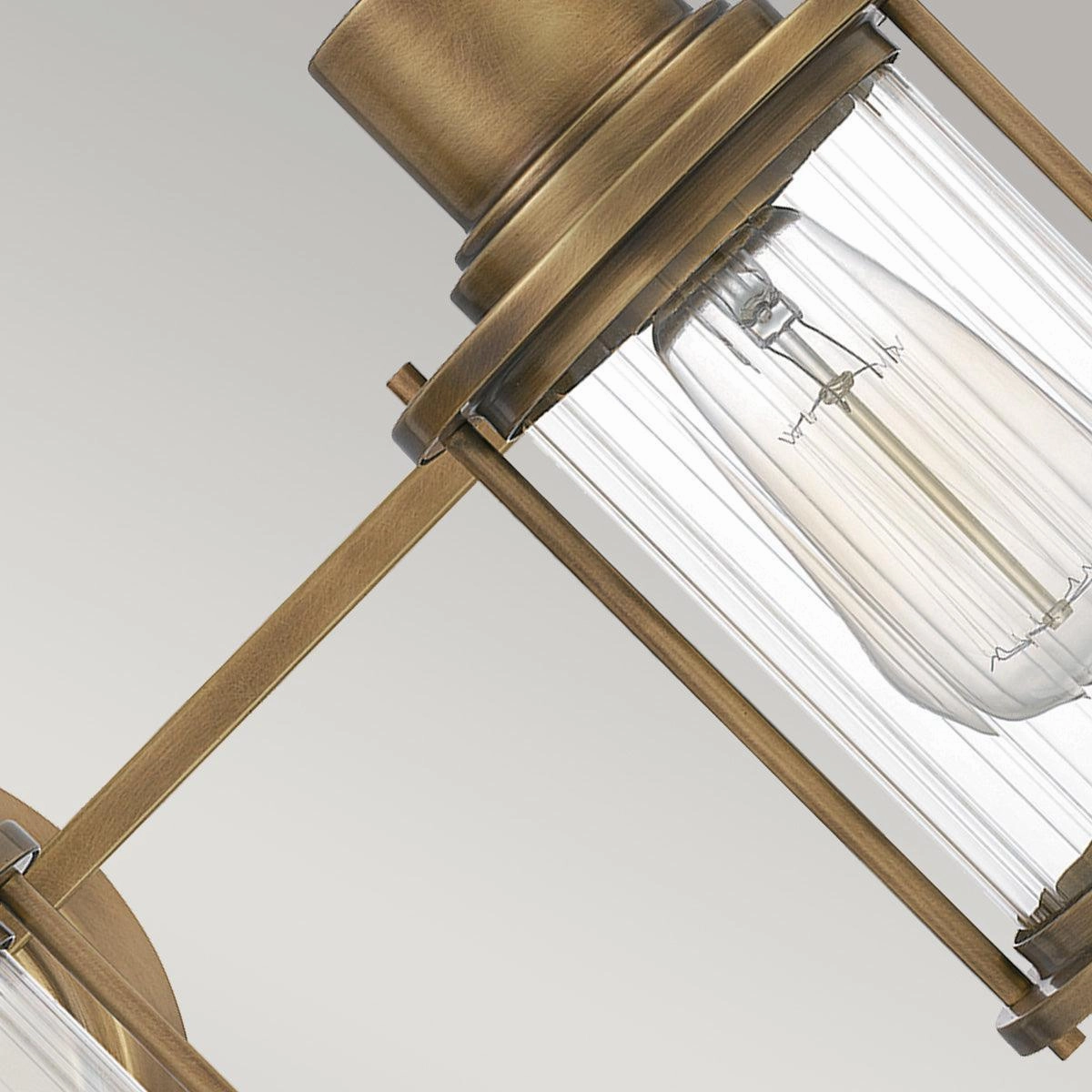 Quoizel Riggs 3 Light Brass Bathroom Wall Light