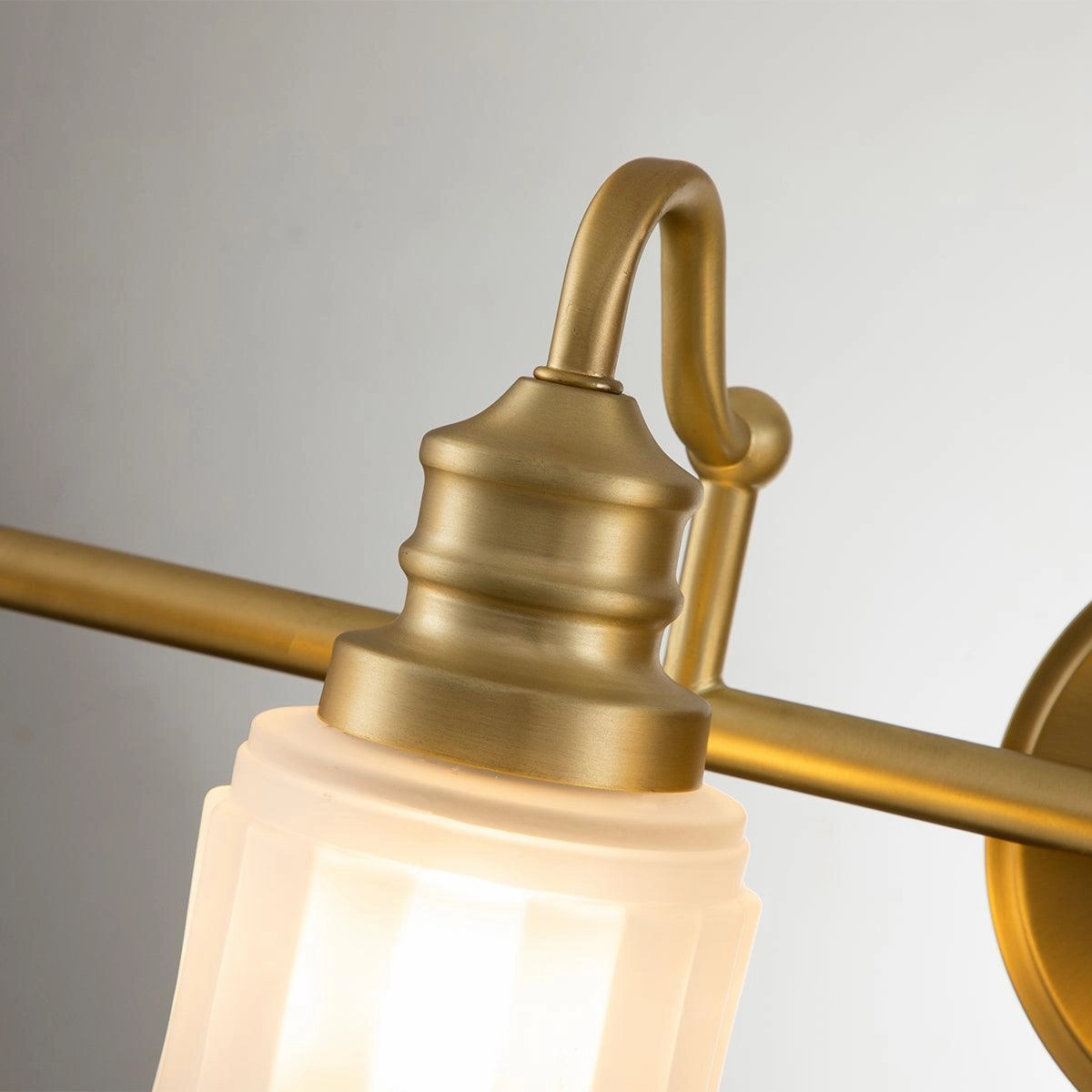 Quoizel Swell 4 Light Brass Bathroom Wall Light
