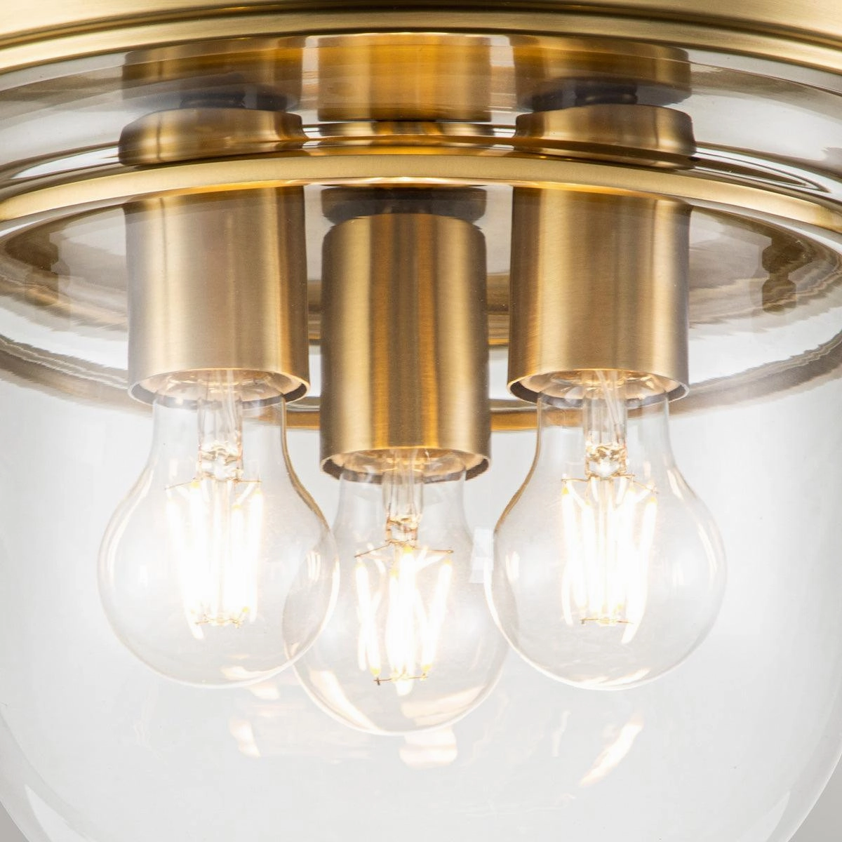 Quoizel Whistling 3 Light Brass Bathroom Ceiling Flush