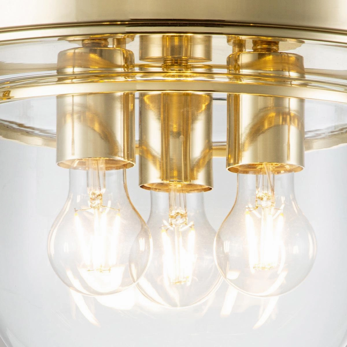 Quoizel Whistling 3 Light Polished Brass Bathroom Flush Mount