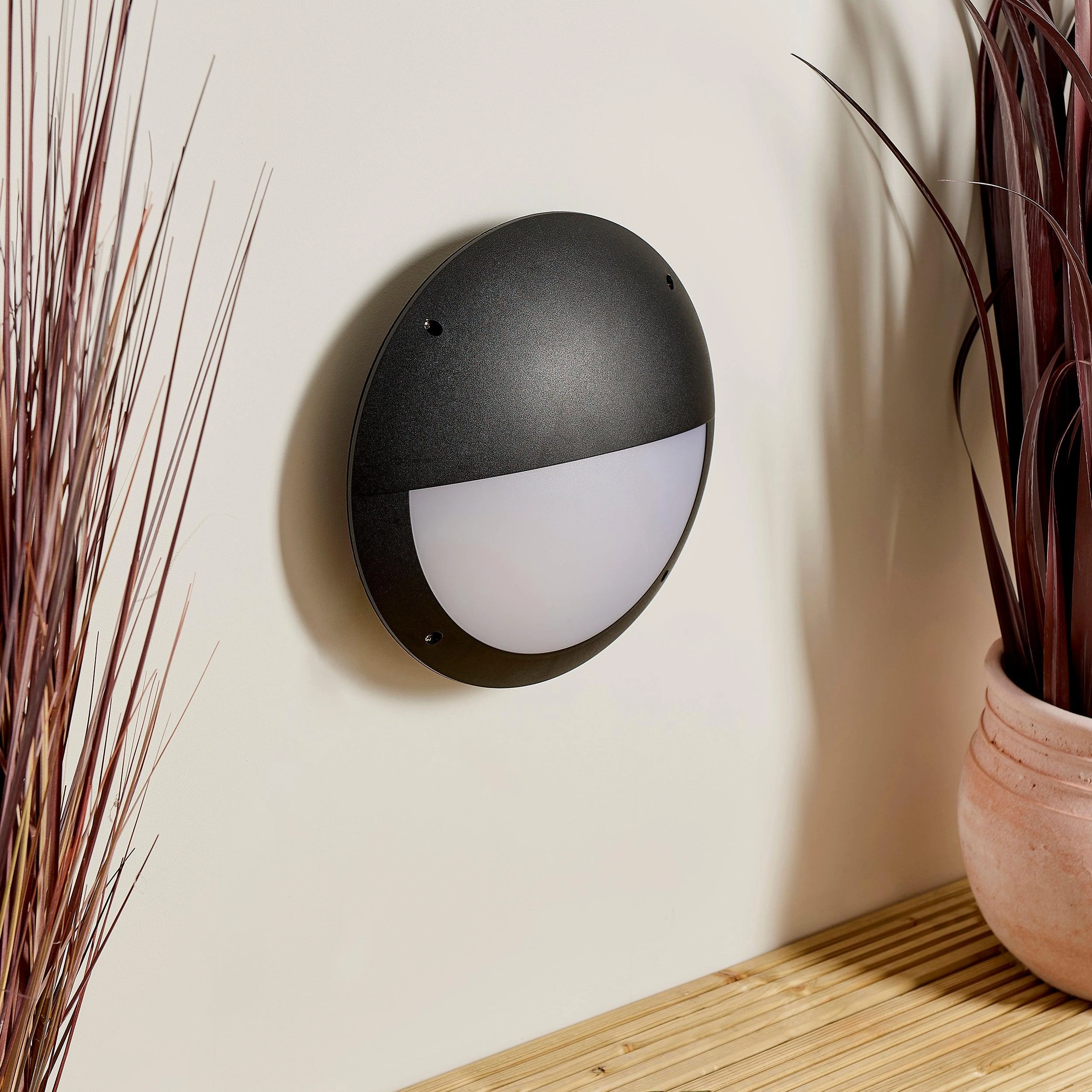 Seran Eyelid Black Outdoor Bulkhead Light IP65 12W